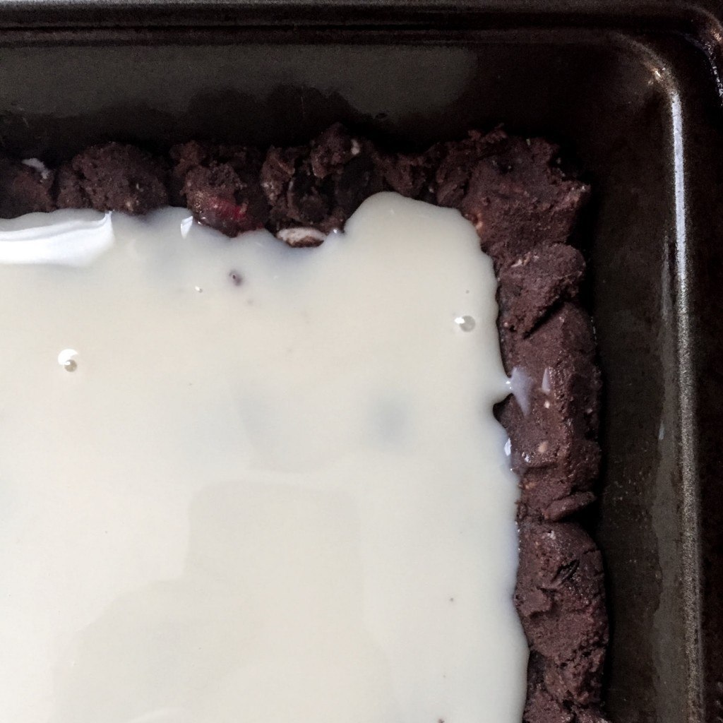 With the bars, you have to make a small ridge to contain the sweetened condensed milk. 